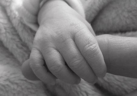 Baby hands Precipitous birth to hypnobirthing mother in Cornwall