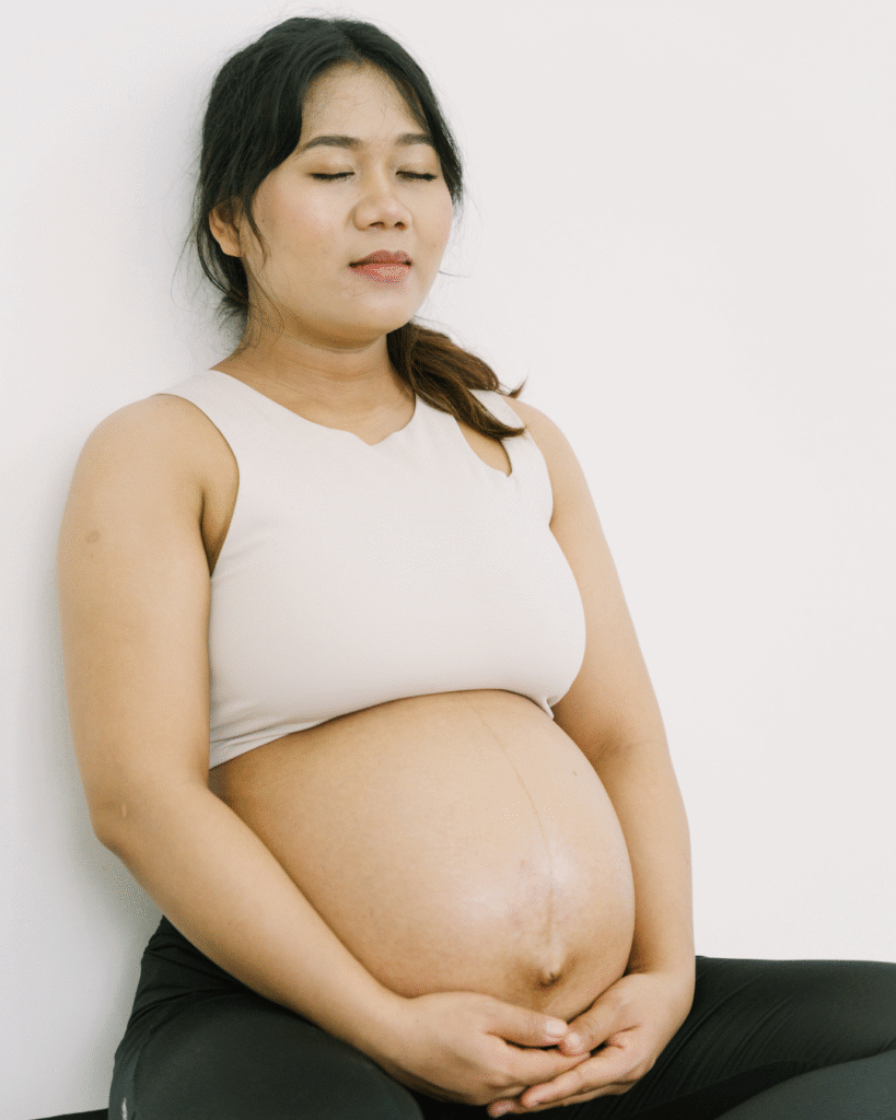 Pregnant woman practising hypnobirthing relaxation