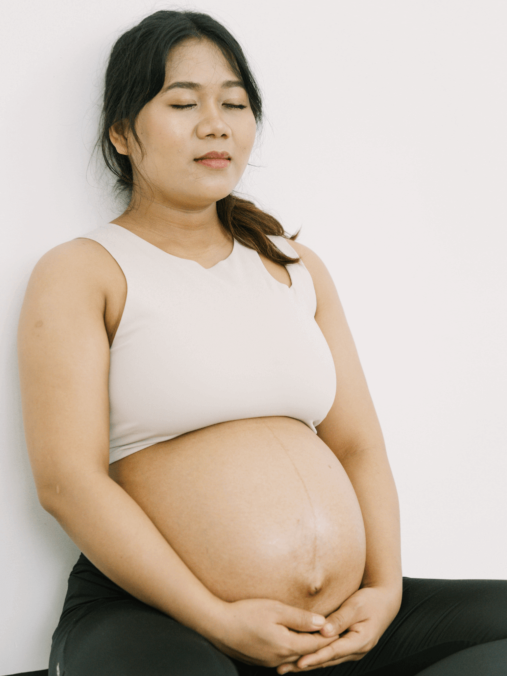 Pregnant woman practising hypnobirthing relaxation