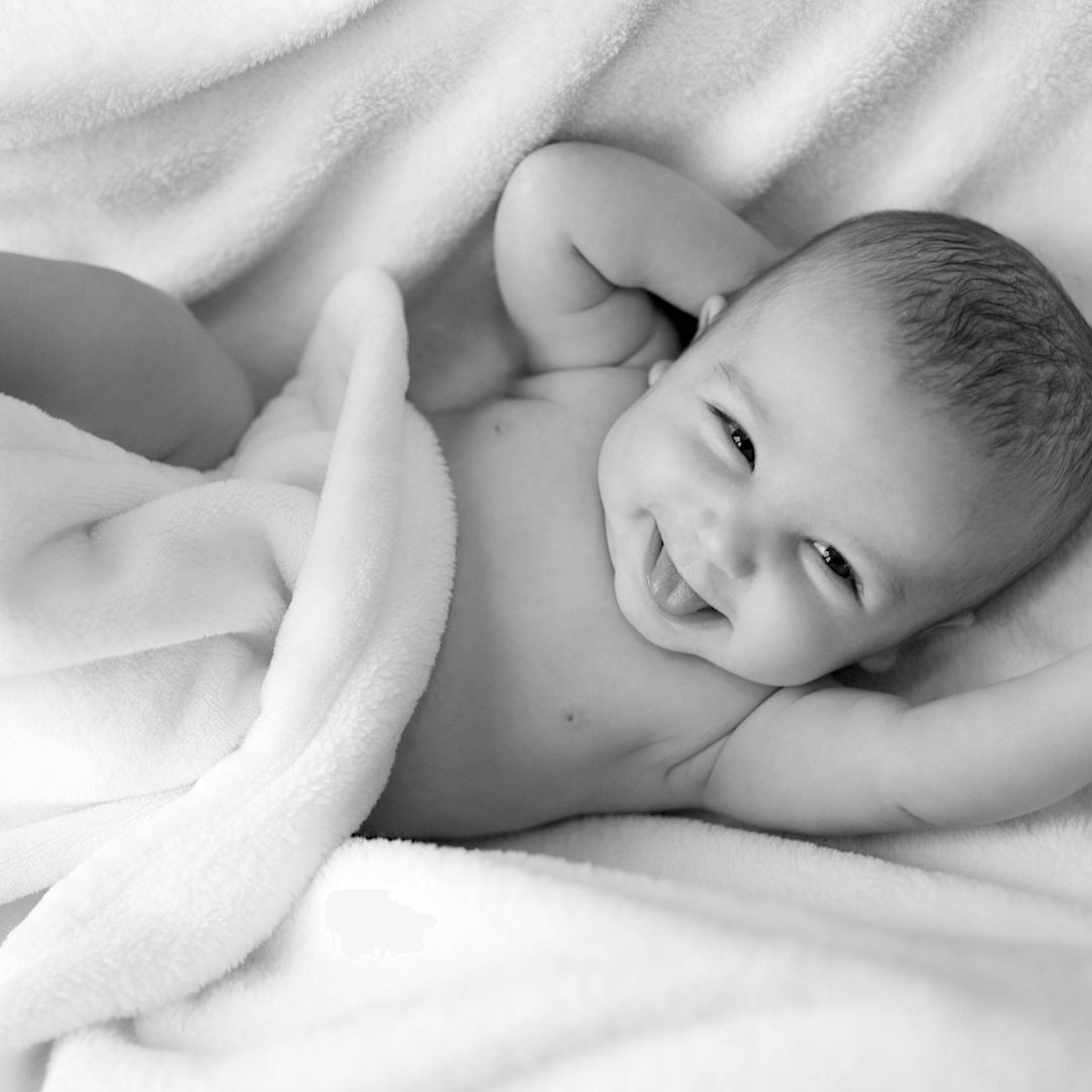 Newborn baby smiling