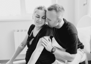 Pregnant woman in labour with birth partner